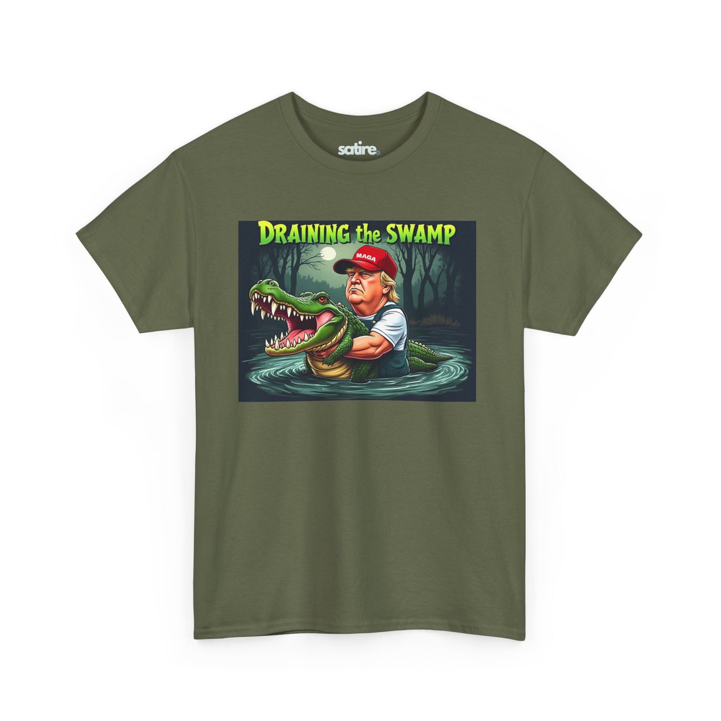 Military green t-shirt with a graphic design featuring a cartoon Donald Trump in waders holding a large alligator in a swamp under a full moon, with the text 'DRAINING THE SWAMP' above in bold yellow and green letters. | Satire Clothes