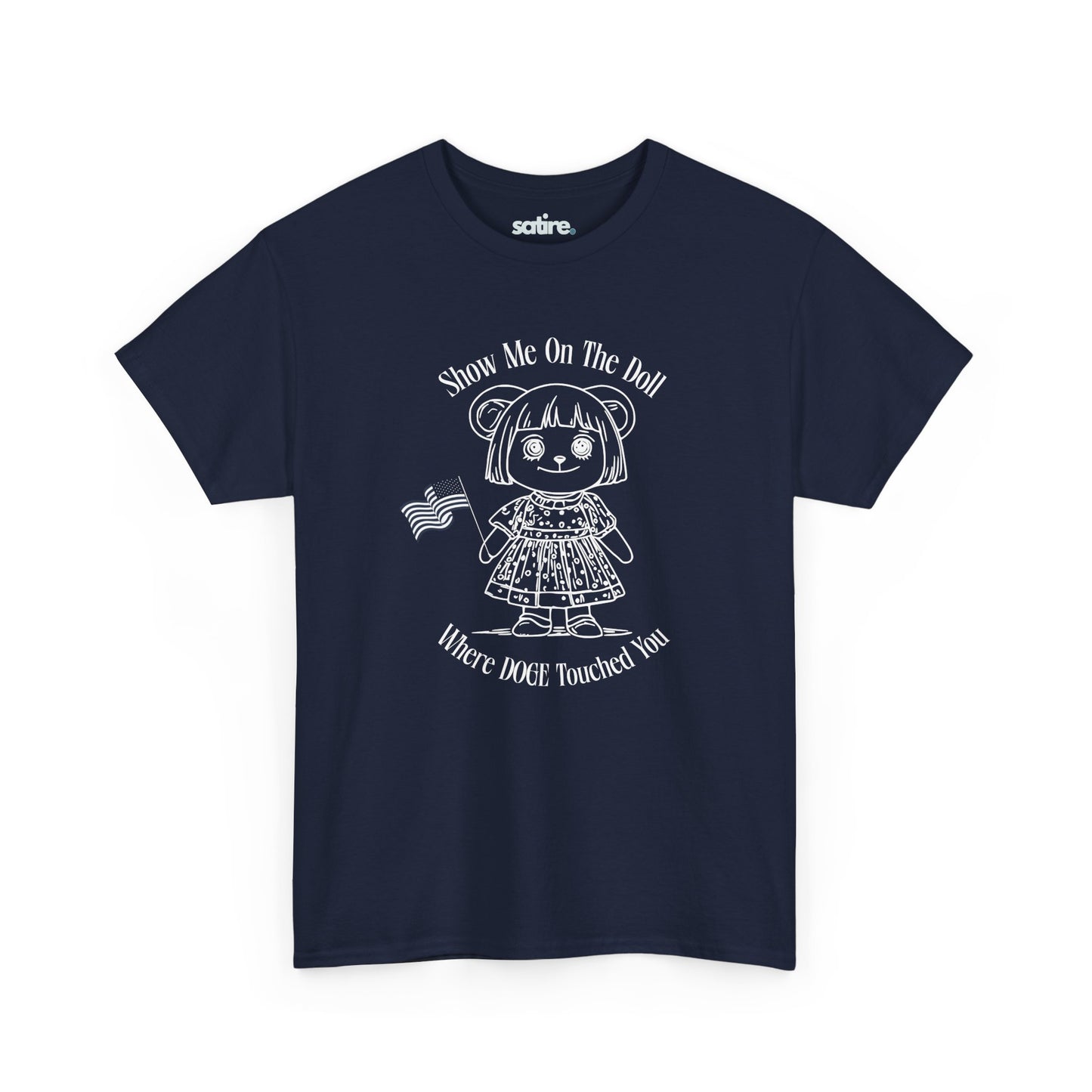 Navy blue t-shirt with a white graphic of a doll holding an American flag. The text reads: "Show Me On The Doll Where DOGE Touched You" | Satire Clothes