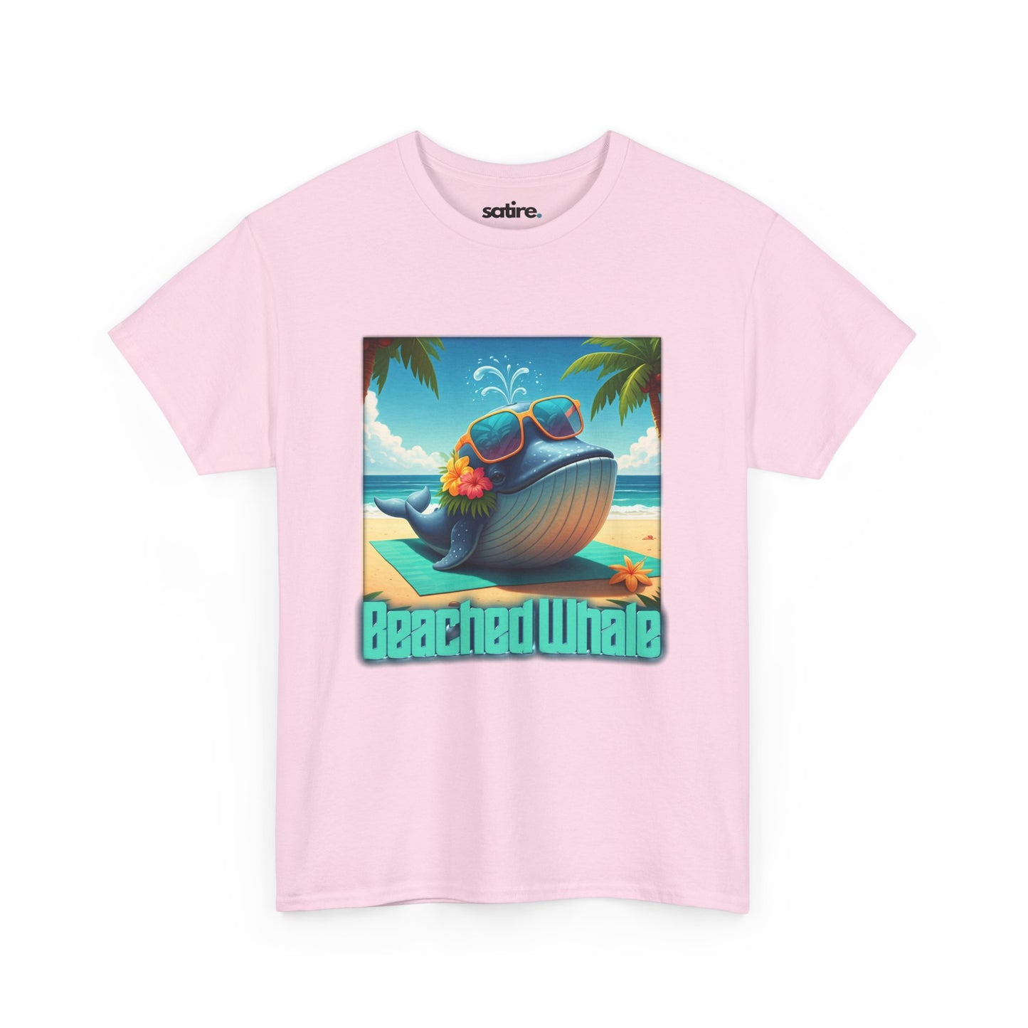 Pink t-shirt with a graphic of a whale on a beach, wearing sunglasses with flowers tucked into the sunglasses. Text below reads 'Beached Whale' | Satire Clothes