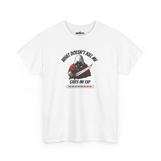 White t-shirt featuring a hooded rogue character with a sword, accompanied by the humorous text "WHAT DOESN'T KILL ME GIVES ME EXP" and a partially filled EXP bar graphic below | Satire Clothes