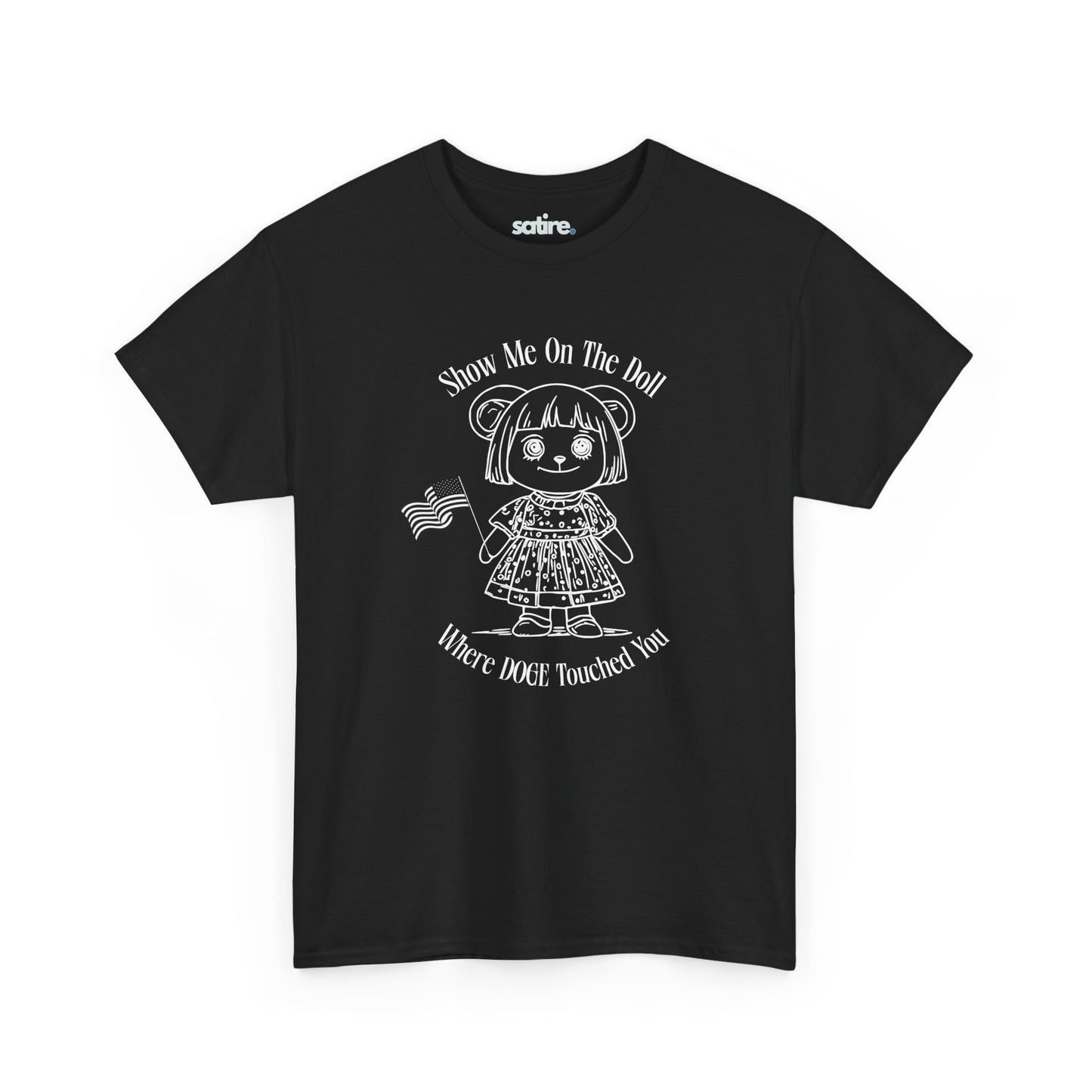 Black t-shirt with a white graphic of a doll holding an American flag. The text reads: "Show Me On The Doll Where DOGE Touched You" | Satire Clothes