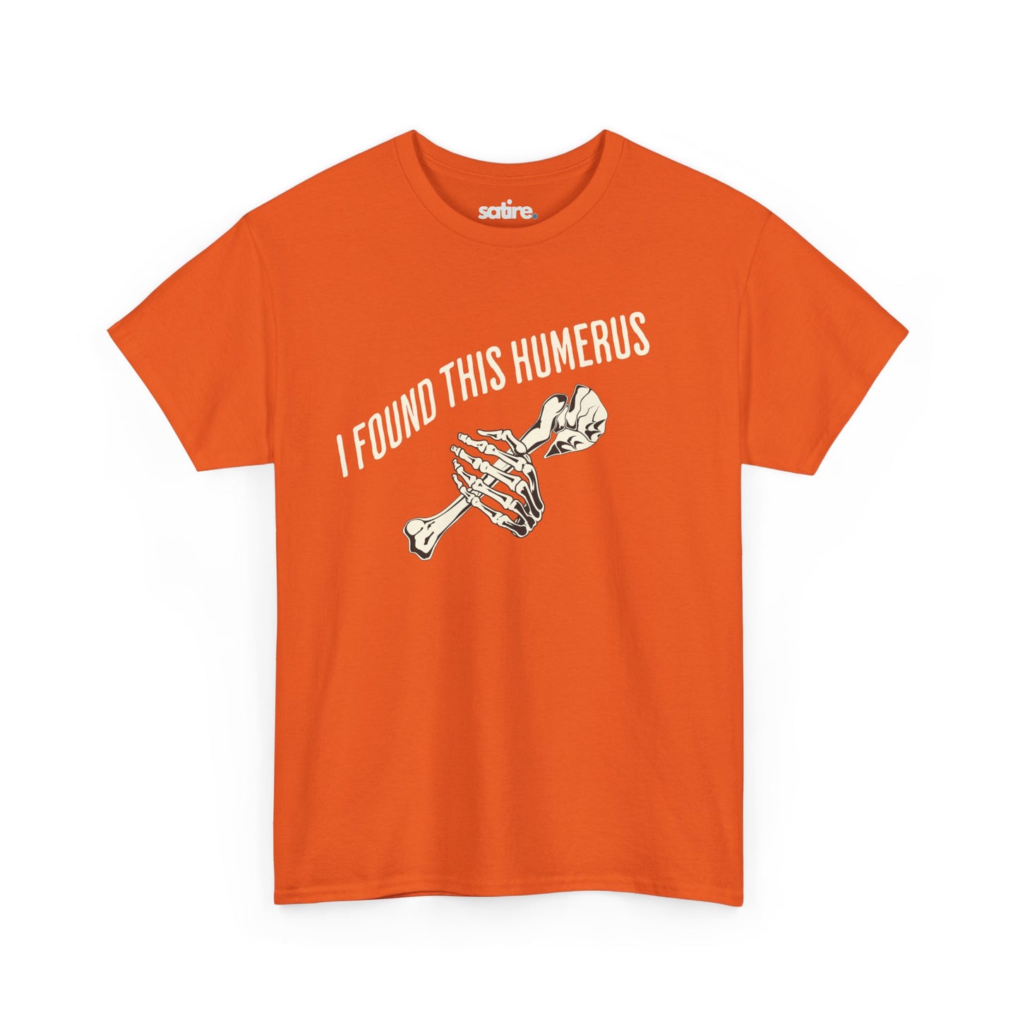 Orange t-shirt with the text 'I FOUND THIS HUMERUS' printed in white. Below the text, there's an illustration of a skeletal hand holding a humerus bone. | Satire Clothes