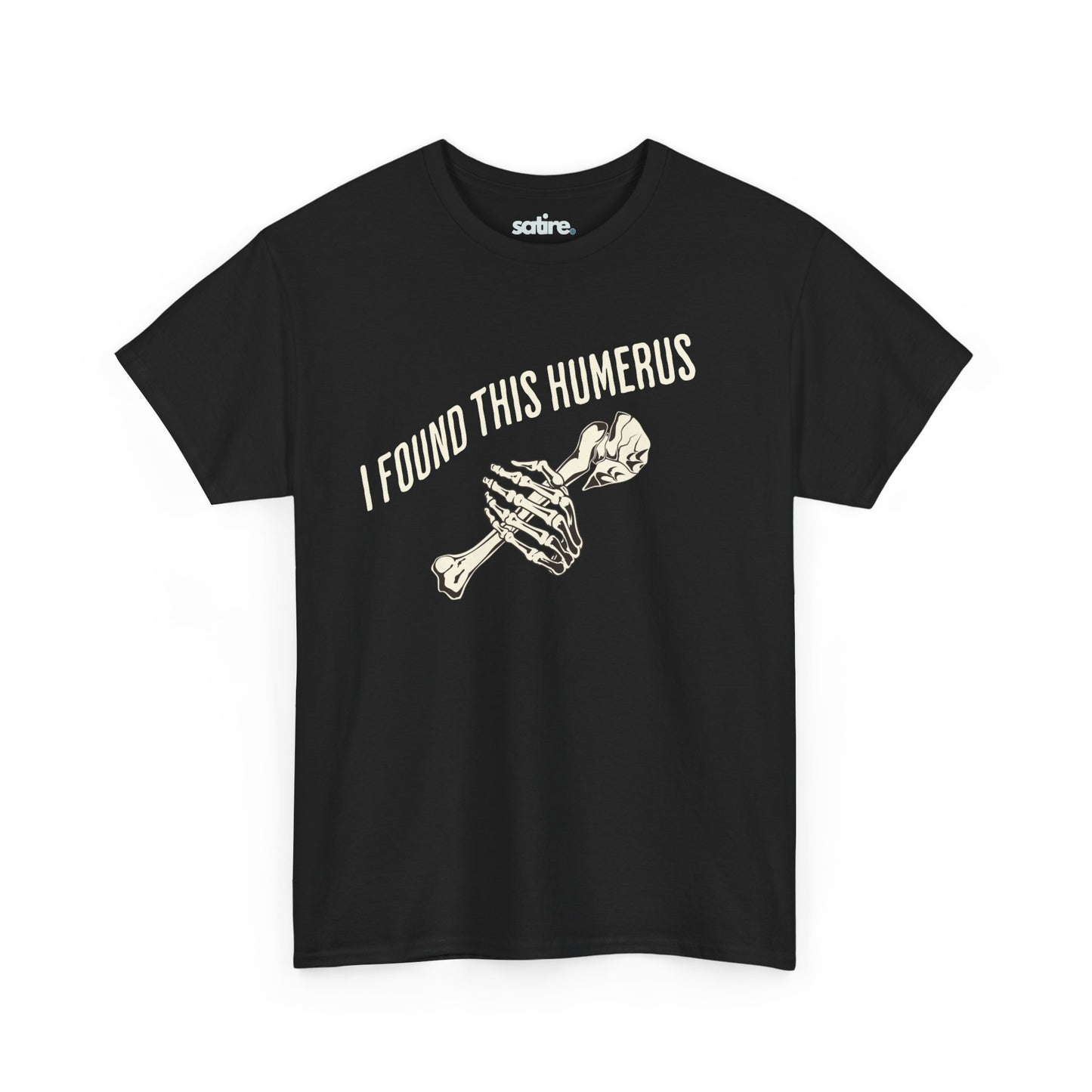 Black t-shirt with the text 'I FOUND THIS HUMERUS' printed in white. Below the text, there's an illustration of a skeletal hand holding a humerus bone. | Satire Clothes