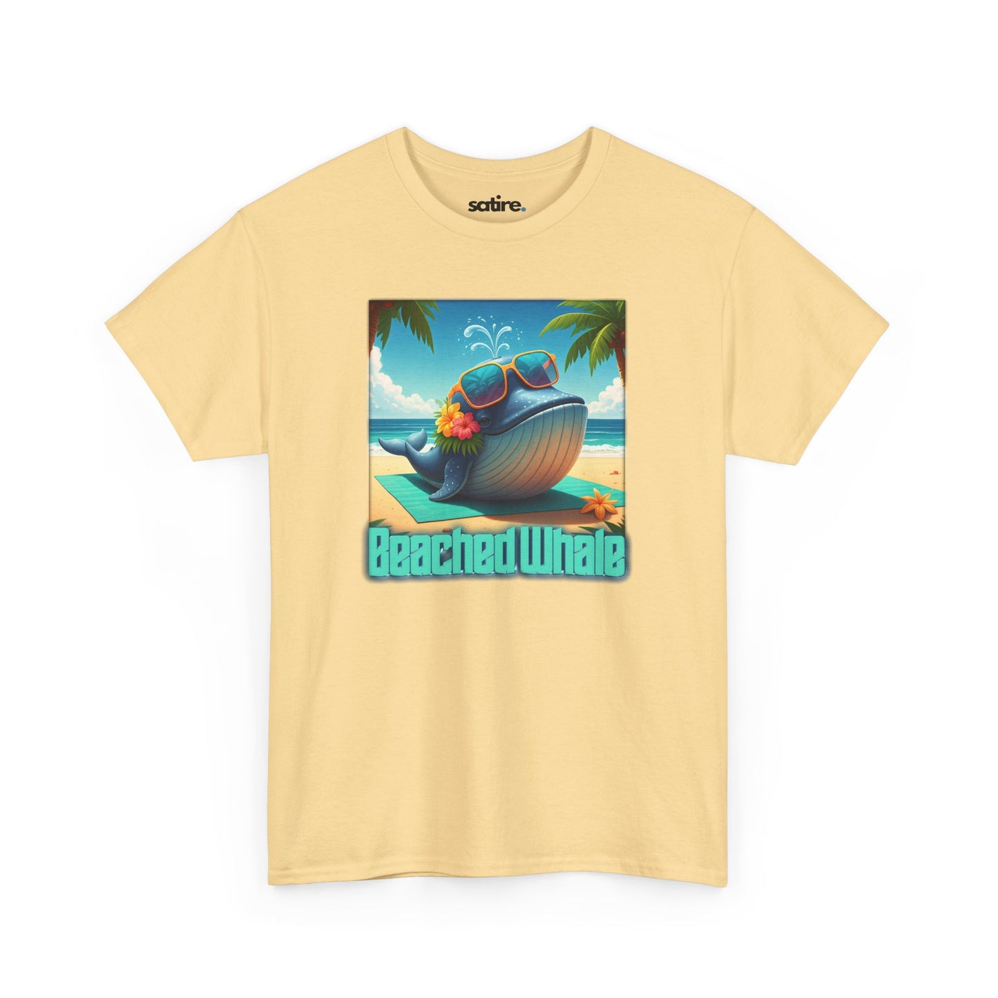 Light yellow t-shirt with a graphic of a whale on a beach, wearing sunglasses with flowers tucked into the sunglasses. Text below reads 'Beached Whale' | Satire Clothes