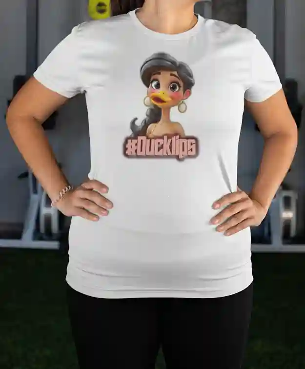 Plus size woman wearing a white t-shirt with a humorous graphic of a character with a duck's beak and the text "#Ducklips" in bold, pink letters | Satire Clothes