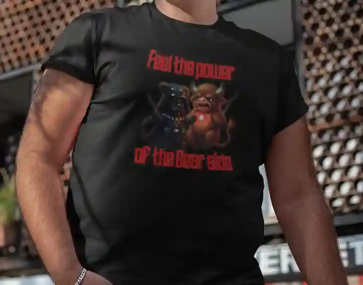 Plus size man wearing a black 'Feel the Power of the Bear Side' t-shirt featuring Bear Vader levitating a bull, with bold red text. | Satire Clothes