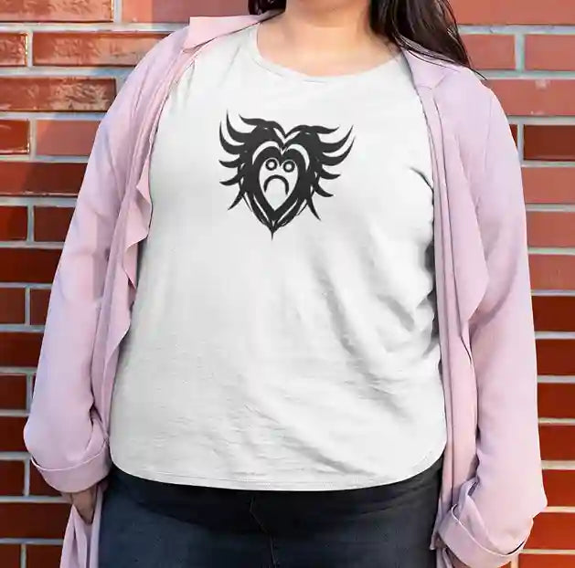 A plus-sized woman wearing a white t-shirt with a black design featuring a sad, crying heart with wing-like extensions. | Satire Clothes