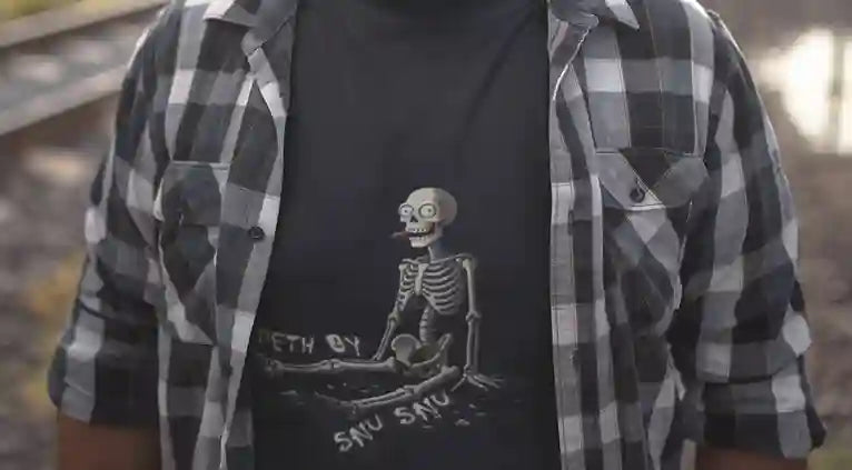 Plus size man wearing a black Deth by Snu Snu t-shirt with a happy skeleton design under a plaid shirt | Satire Clothes