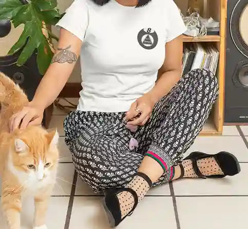 Woman wearing a white t-shirt with a graphic of a Magic 8 Ball which displays the message "You're Screwed" inside a triangle. | Satire Clothes